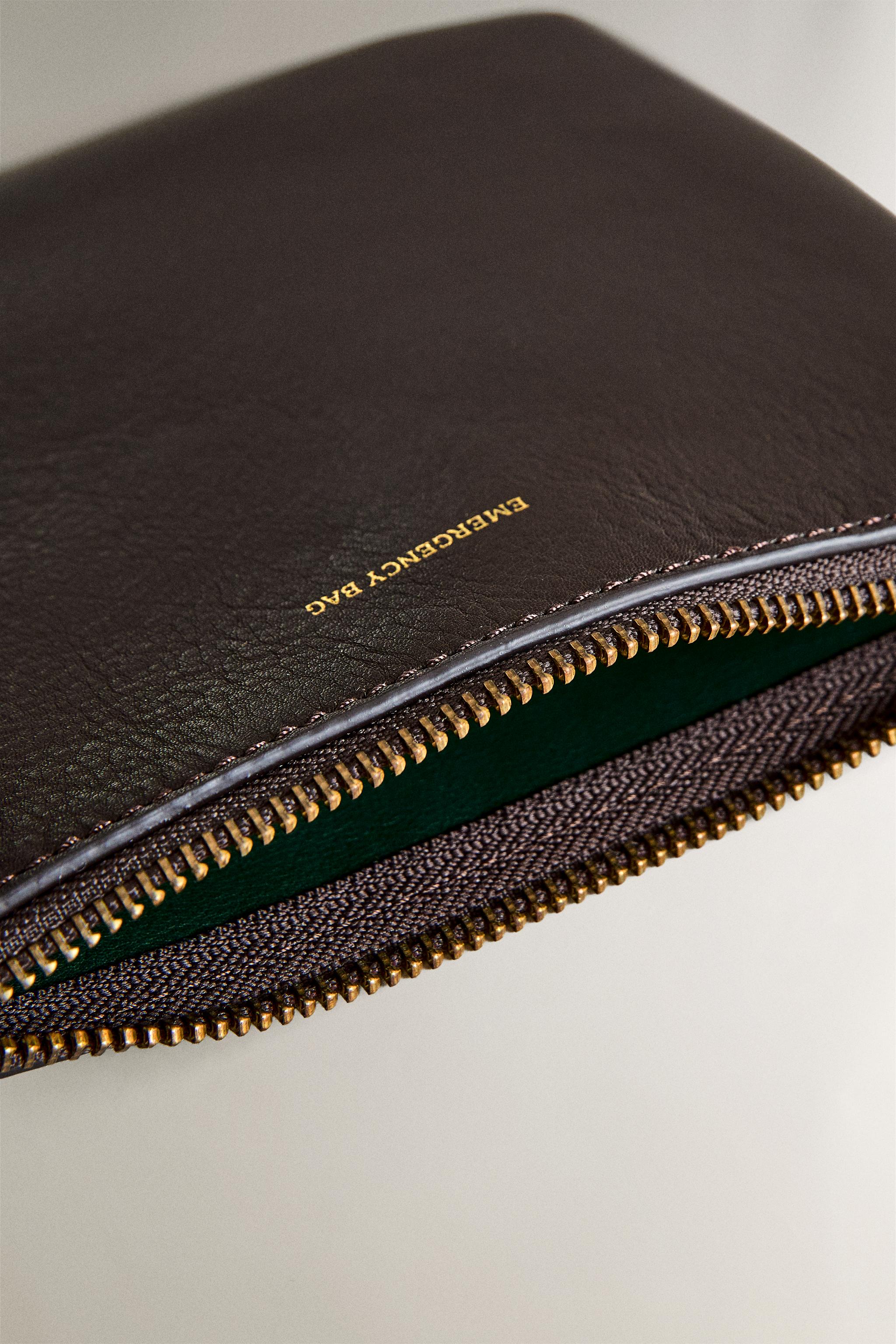 LEATHER "EMERGENCY BAG" MAKEUP BAG